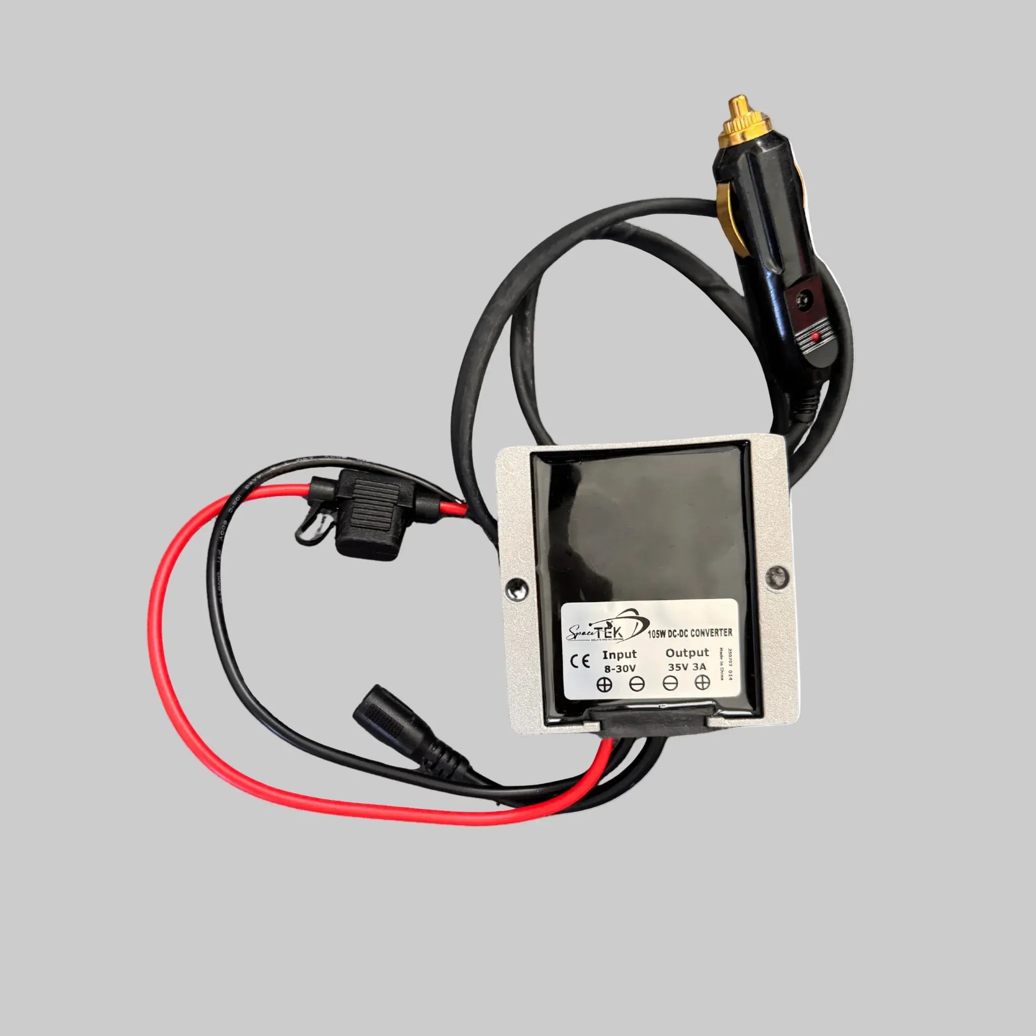 12V aluminium voltage booster regulator with ciggarette plug and DC output connector, shown on white background