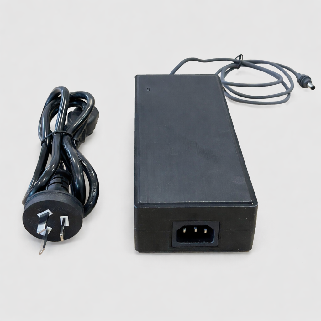 Rear view of 57V 4A AC DC power supply adapter showing IEC power input socket