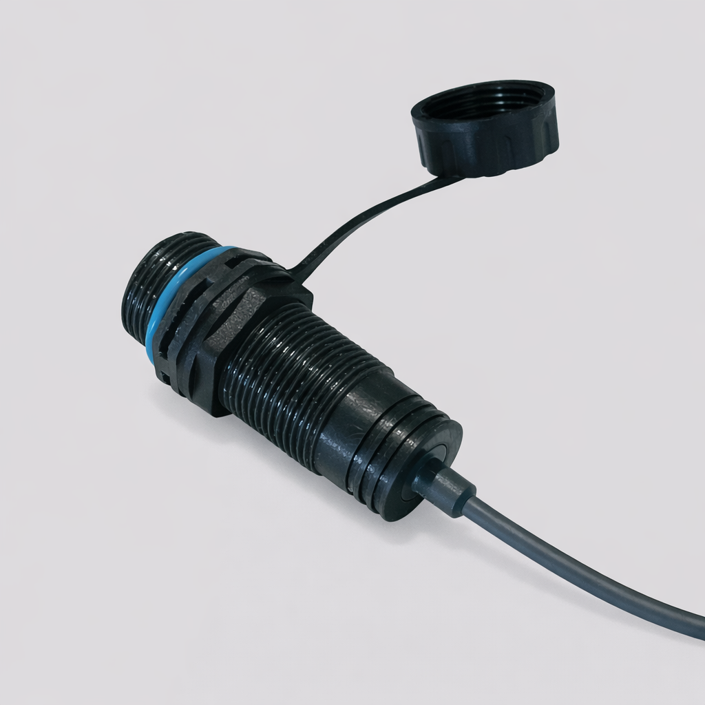 Top-down view of Starlink Starlink Mini DC panel connector socket with cap open, showing sealing detail and waterproof housing