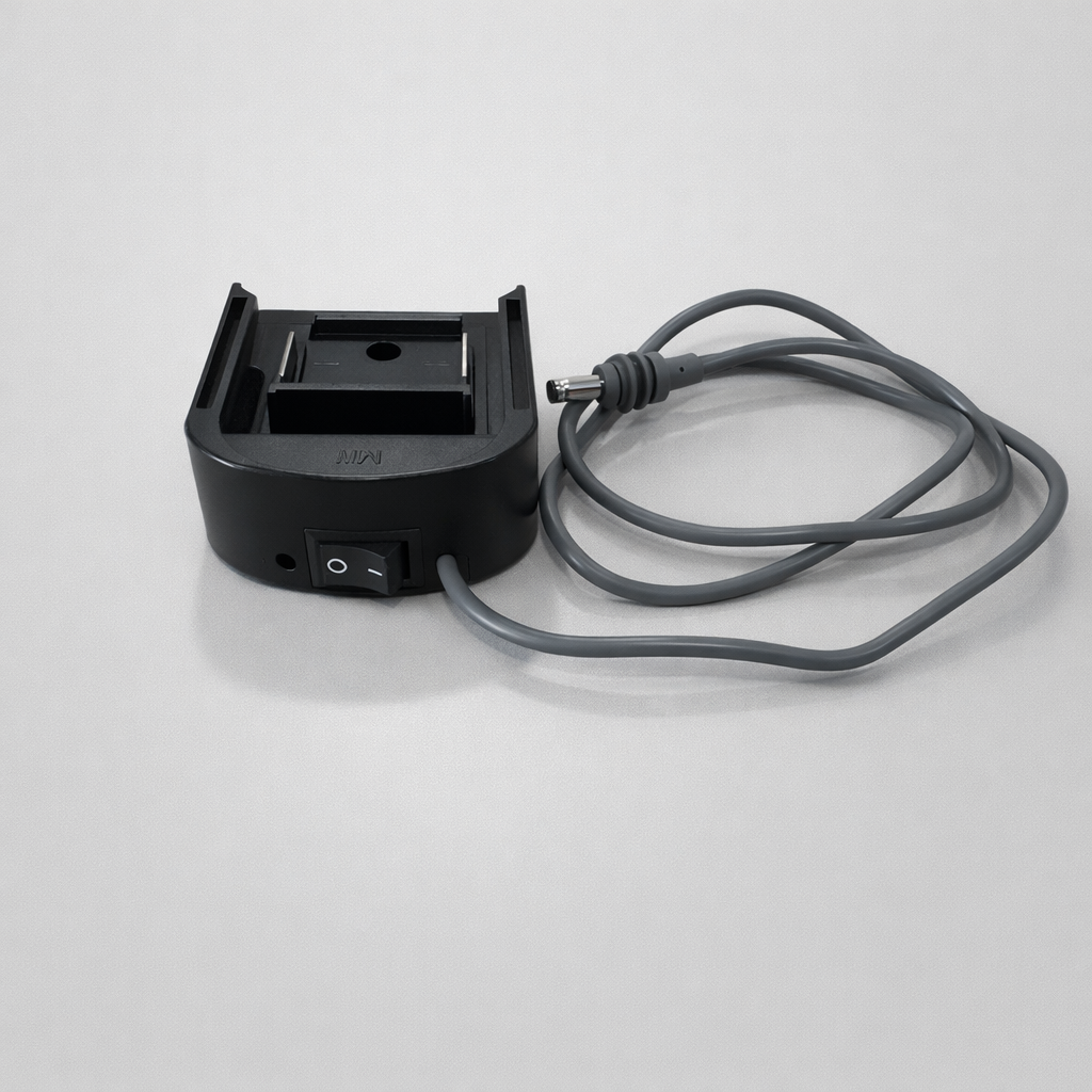 Spacetek Makita battery adaptor for Starlink Mini displayed with separate DC cable and barrel plug connector on light grey background