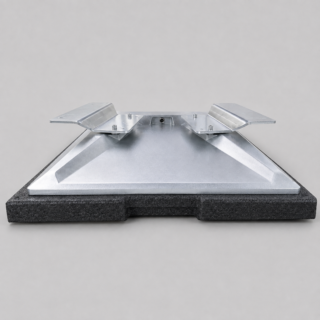 Low-profile view of the raw aluminium flat mount adaptor mounted to a Starlink Gen 3 Performance dish
