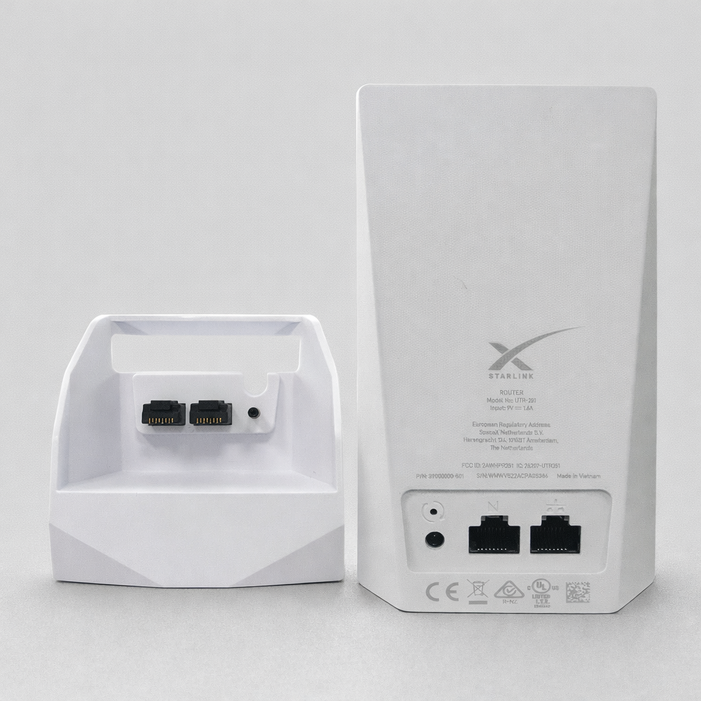 Starlink Mini docking station rear view showing WAN port, three LAN ports and DC power input