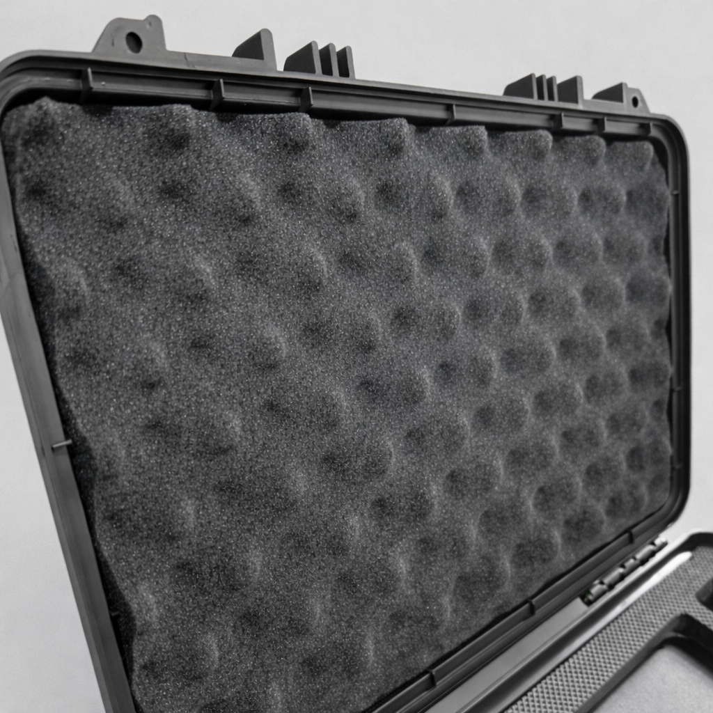 Close-up of egg crate foam padding inside Starlink Mini tough case lid for shock protection during transport