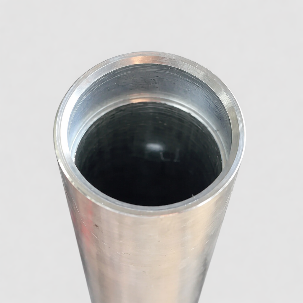 Top-down view of a machined aluminium mast tube from the Starlink Gen 2 tin roof mount kit, showing clean bore and chamfered edge