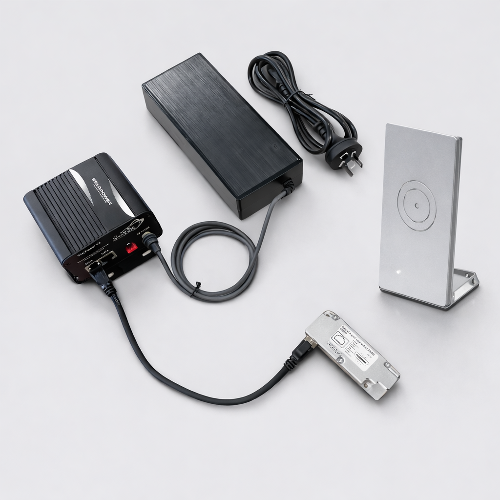 Starlink Router Mini shown with PoE injector, power supply, AC cable, Ethernet cable, and adapter arranged on a light grey background