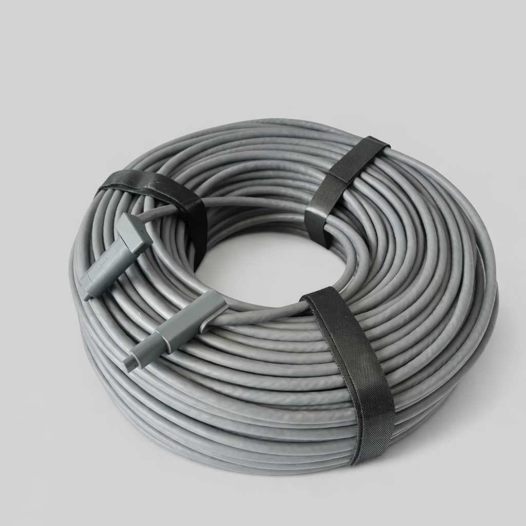 SPX Gen 2 Starlink replacement cable coiled with velcro straps, featuring right-angle and SPX connectors for easy deployment