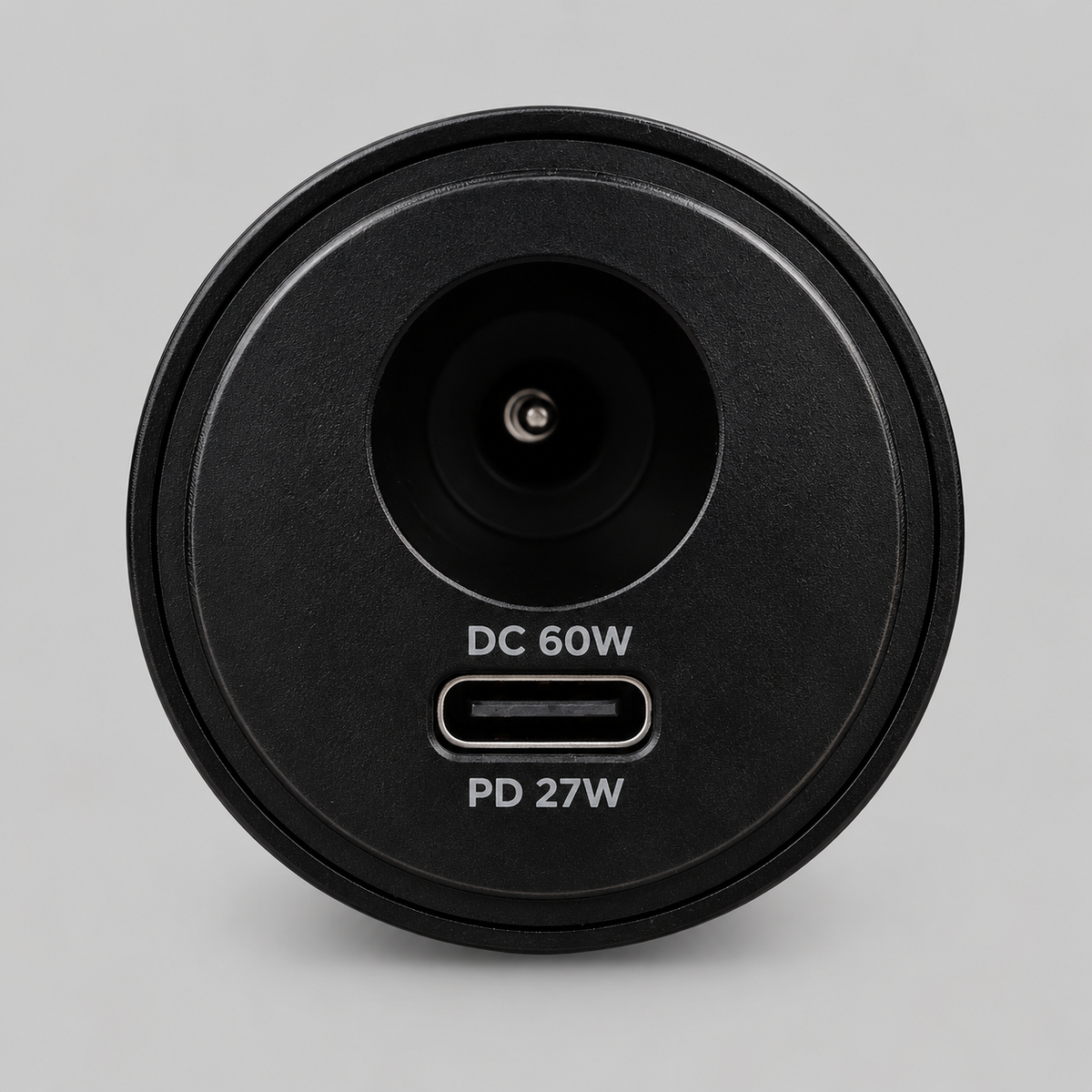Starlink Mini 2-in-1 12V/24V car power adapter port detail showing DC 60W and USB-C PD 27W outputs