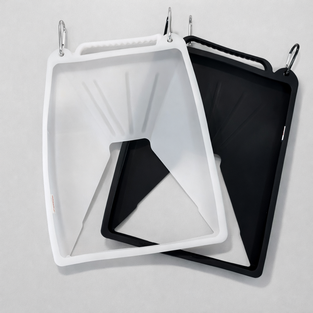 Black and white silicone protective covers for Starlink Mini dish stacked together with carabiner clips and carry handle