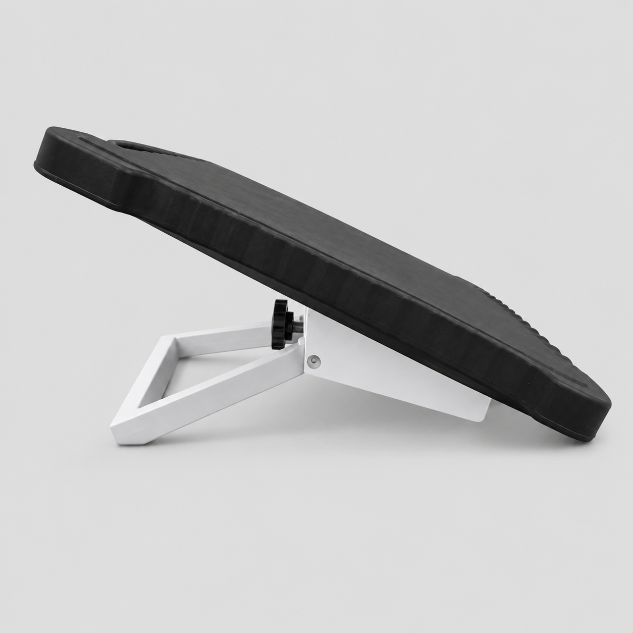 Side profile of black silicone protective cover fitted to Starlink Mini with adjustable stand
