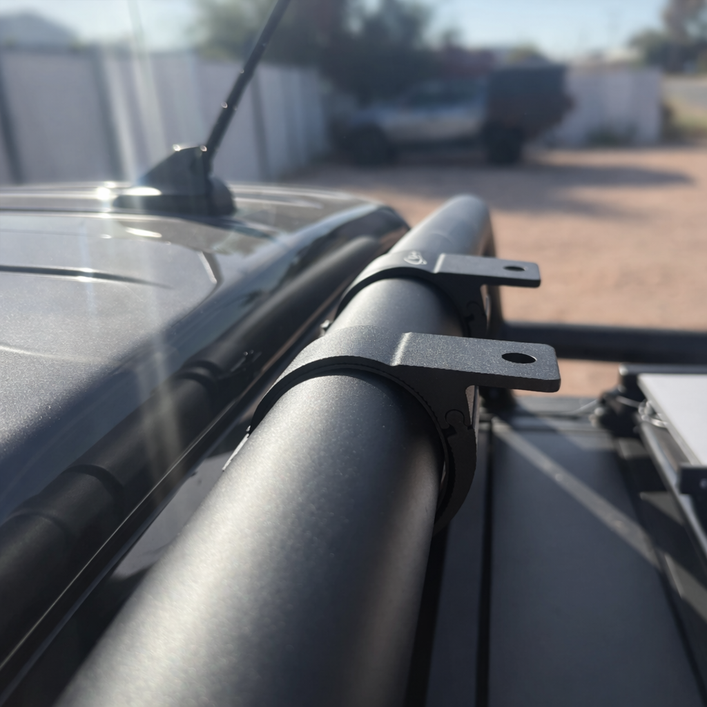 Close-up of Starlink Mini compatible aluminium tube mount clamp installed