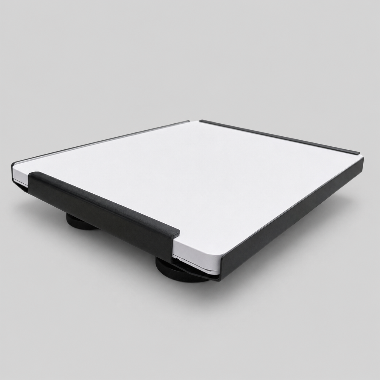Angled front view of the Starlink Mini Vehicle Magnet Mount in carbon steel with four 65mm (2.5 inch) heavy-duty magnets and a white mounting surface
