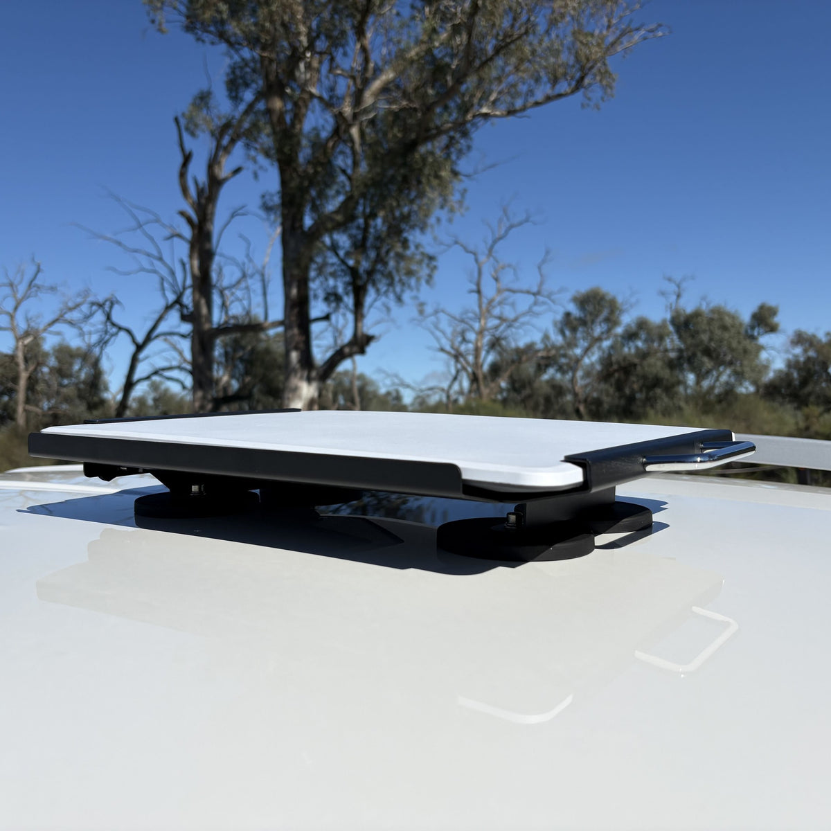 Starlink V5 Robust Magnetic Roof Mount installed on a vehicle roof, angled front view